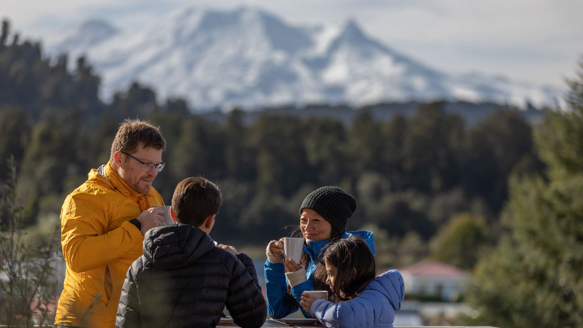 Family dining on the deck Ohakune - Visit Ruapehu - Hero.jpg